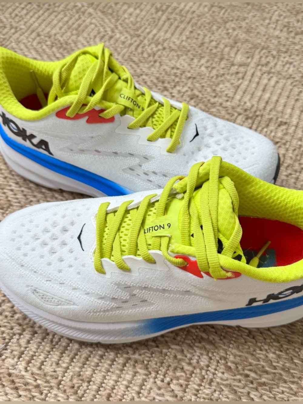 Gently used HOKA Clifton 9 road-running shoes